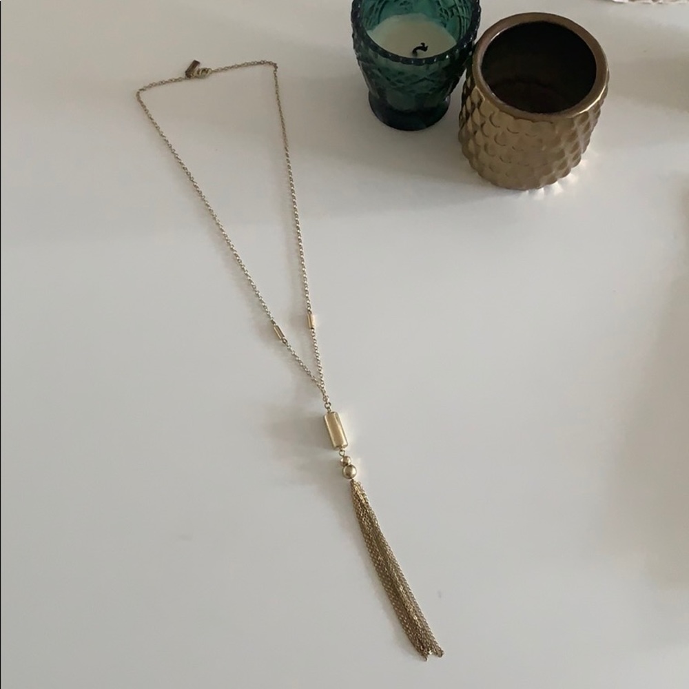 Gold tassel pendant